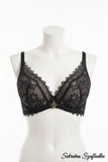 Black geometric lace bra front view on white torso