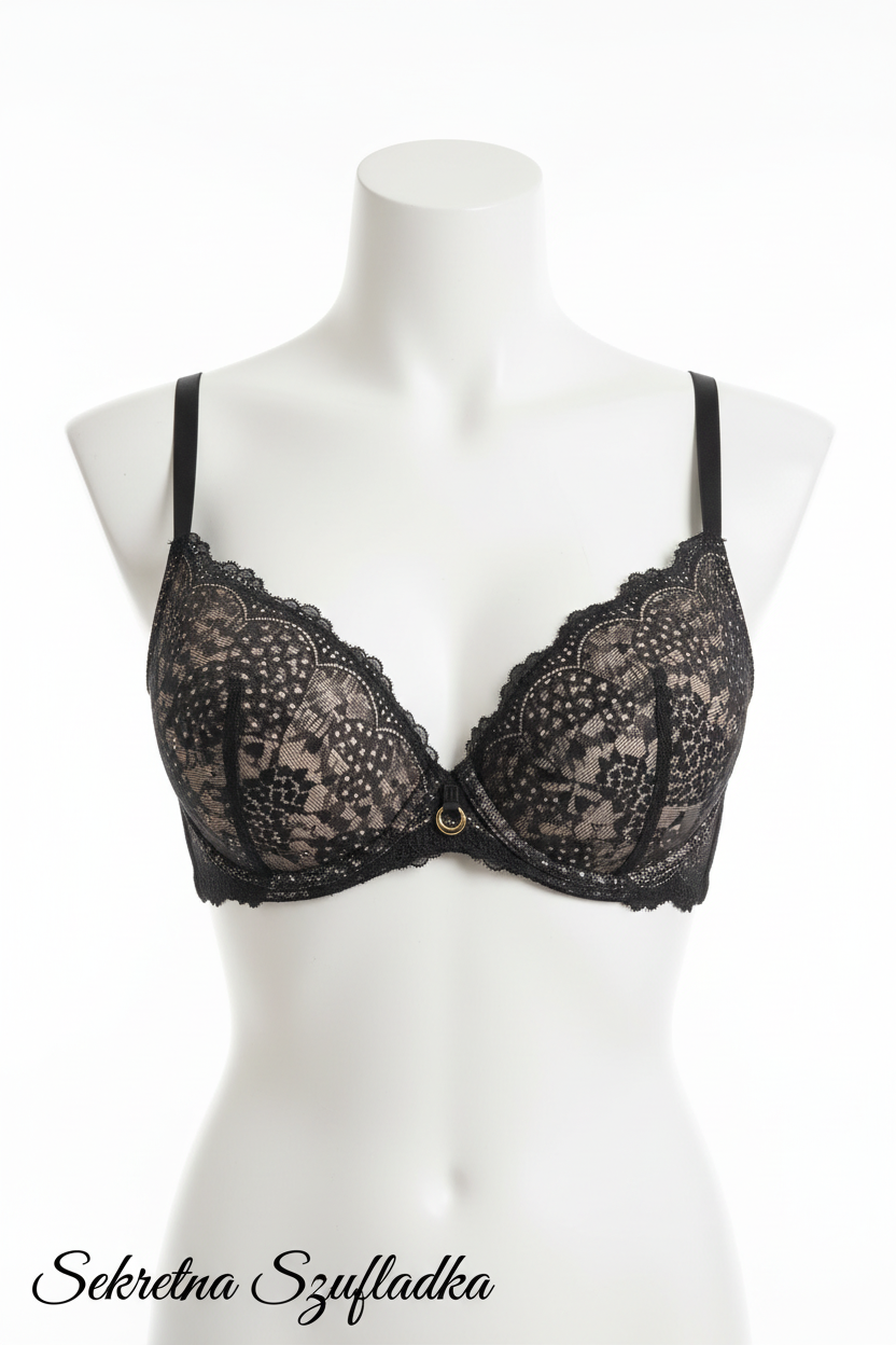Black lace bra front view on white torso
