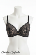 Black lace bra front view on white torso